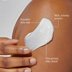 Beekman 1802 open jar top view displaying smooth whipped body butter