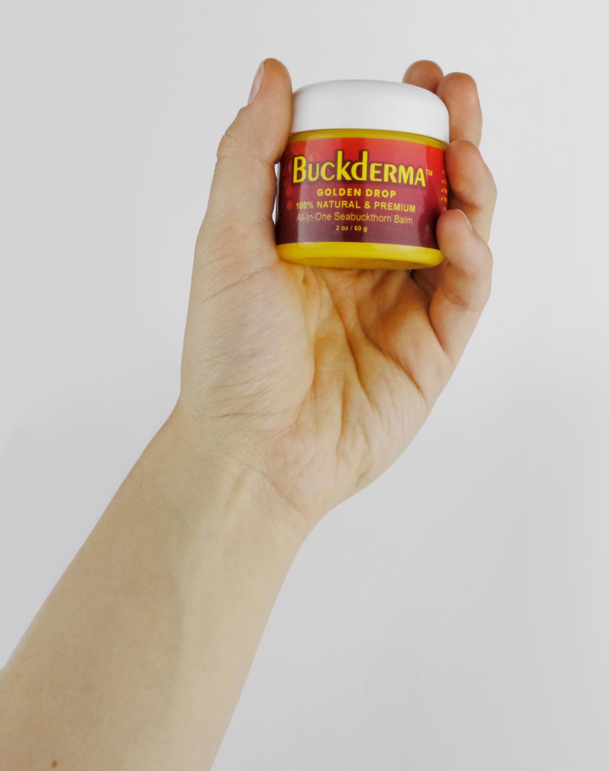 Beesaluxe Buckderma ingredient flatlay with seabuckthorn and oils highlighting natural formulation benefit