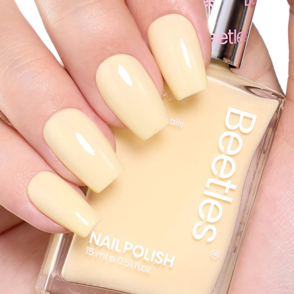beetles polish outdoors on nails showing spring vibe and wearable color benefit