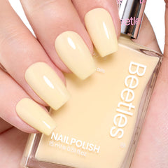 beetles polish outdoors on nails showing spring vibe and wearable color benefit