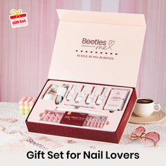 Beetles cuticle oil applied to finished nails improving shine and health