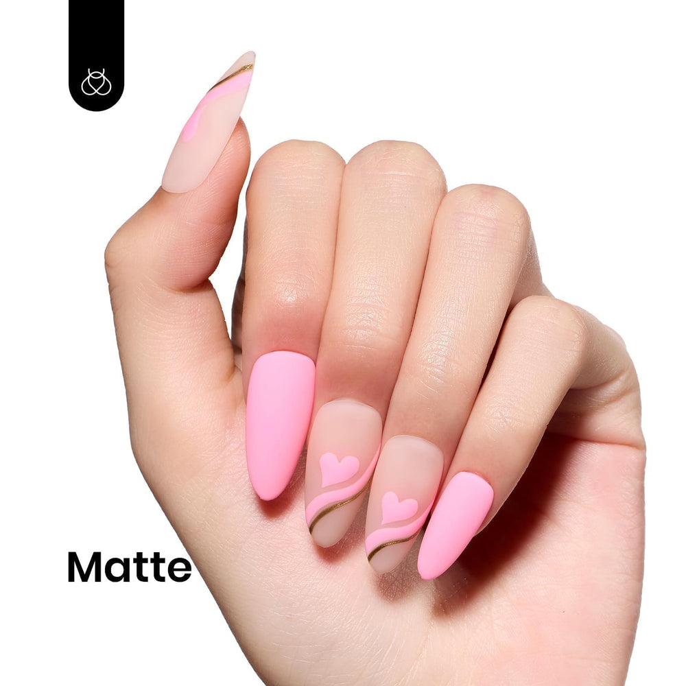 Beetles Gel Polish Flamingo Feather applied on hands in lifestyle scene for polished look