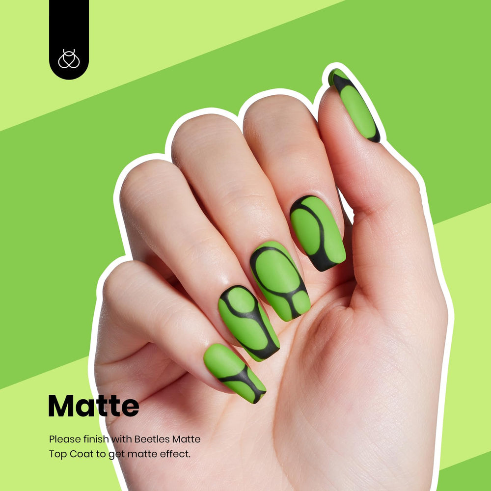 Beetles polish applied in salon setting demonstrating glossy finished manicure