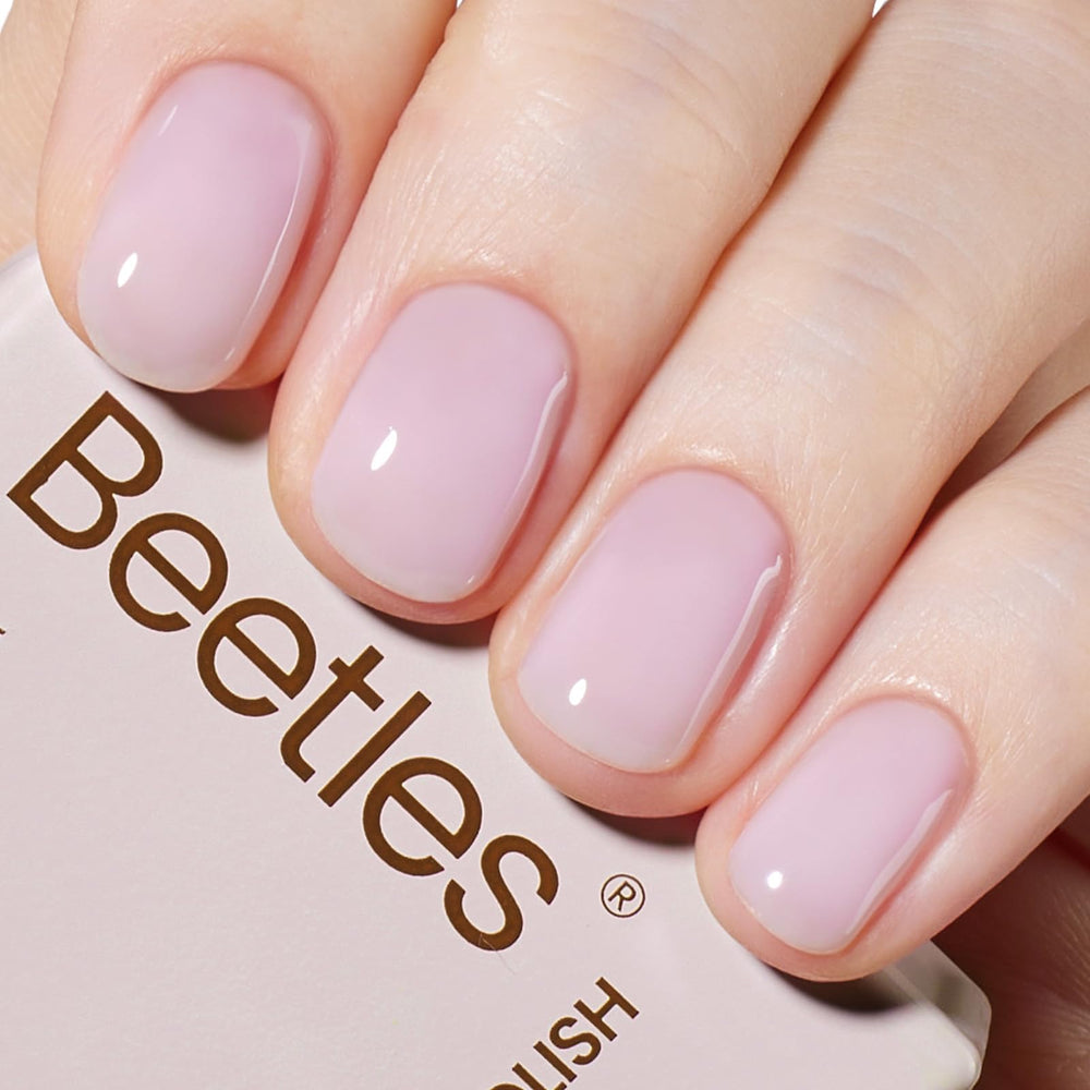 Beetles bottle front view showing nude purple jelly and compact 15ml size benefit of portability