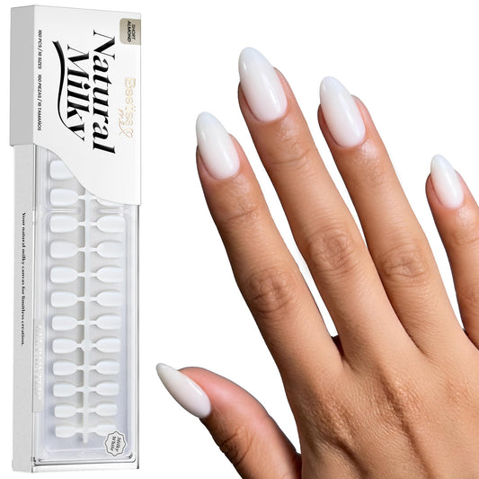 Beetles front packaging showing milky white press on nails and clear kit benefit