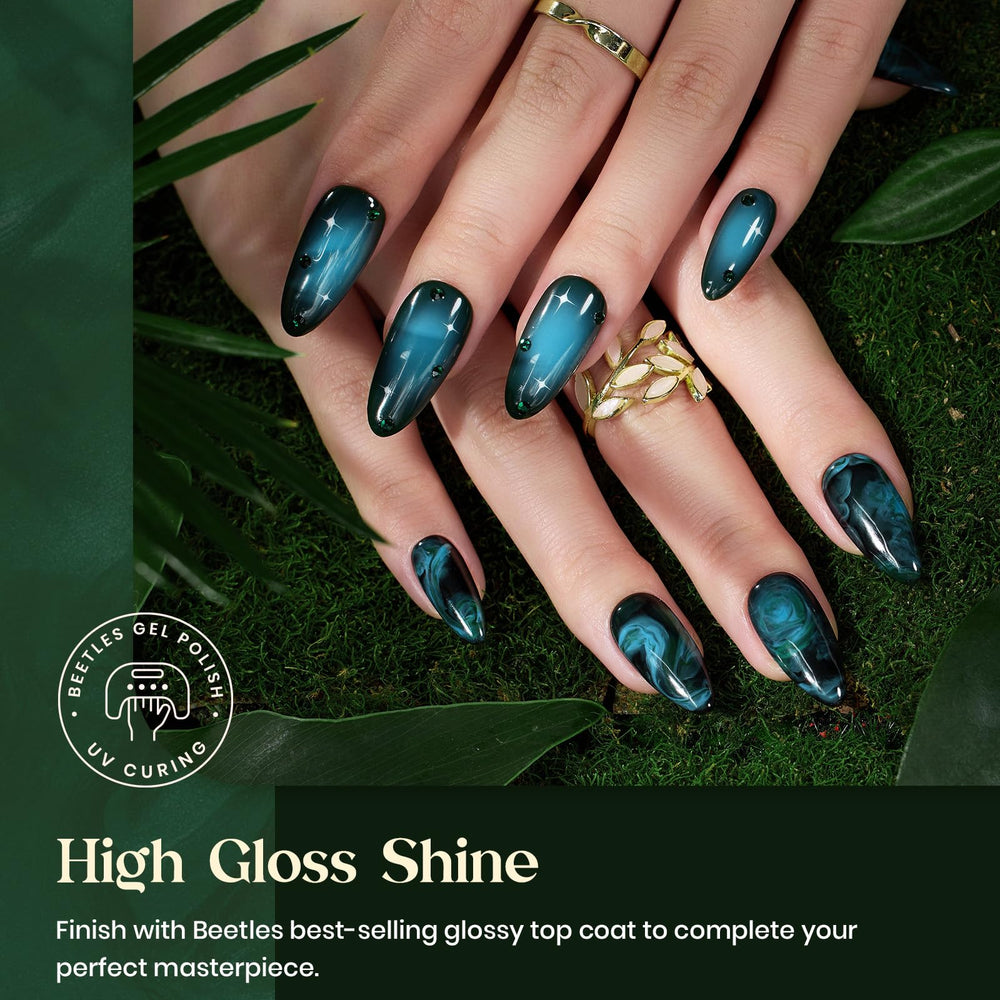 Beetles gel applied on nails curing under LED lamp for fast durable finish