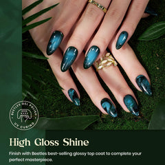 Beetles gel applied on nails curing under LED lamp for fast durable finish