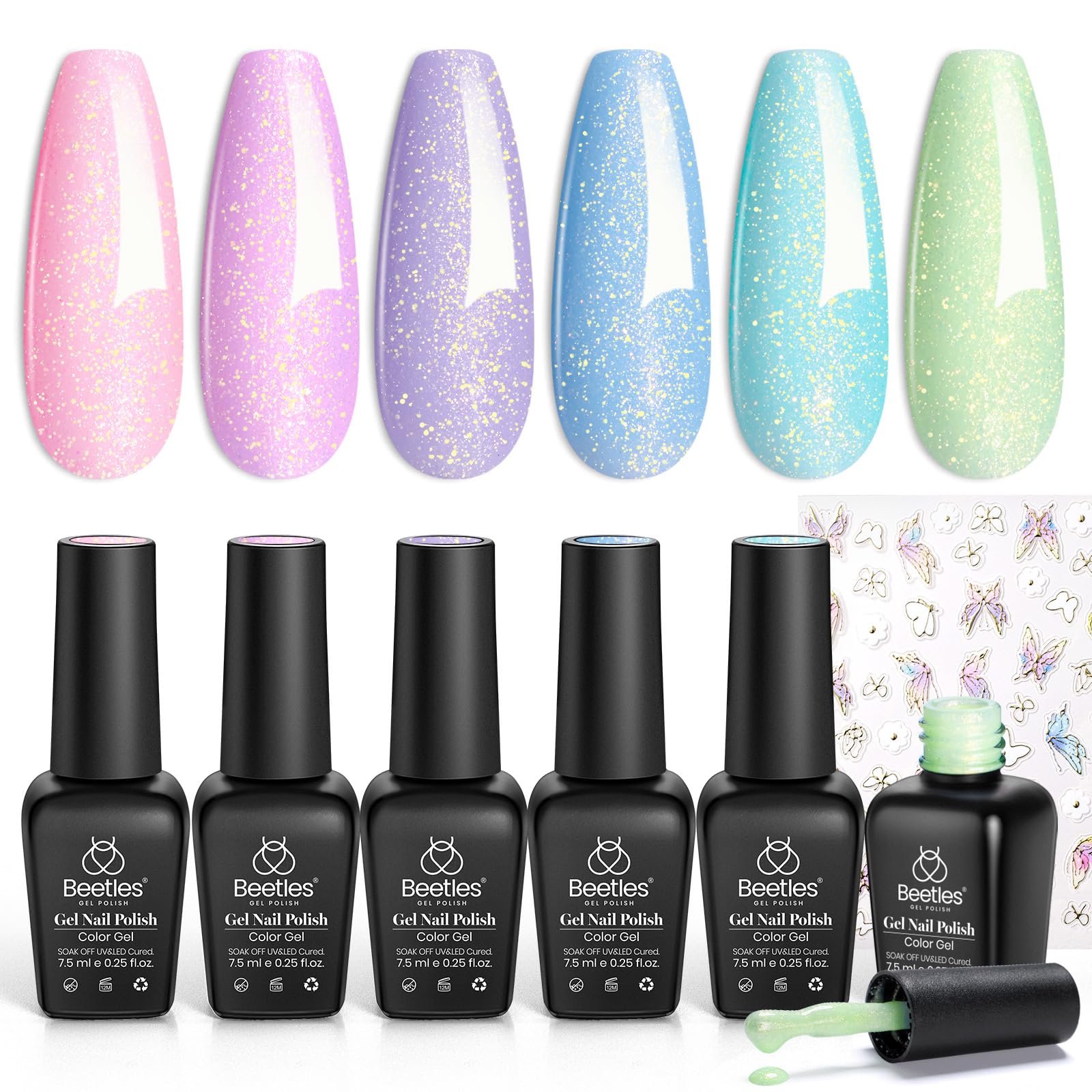 beetles lifestyle image of spring manicure on hands styled with flowers, polished look