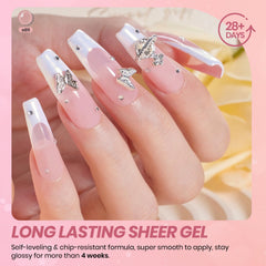 beetles hand wearing French manicure showing subtle natural finish