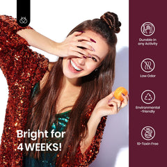 Beetles nails on hand wearing Mellow Plum showing salon finish benefit