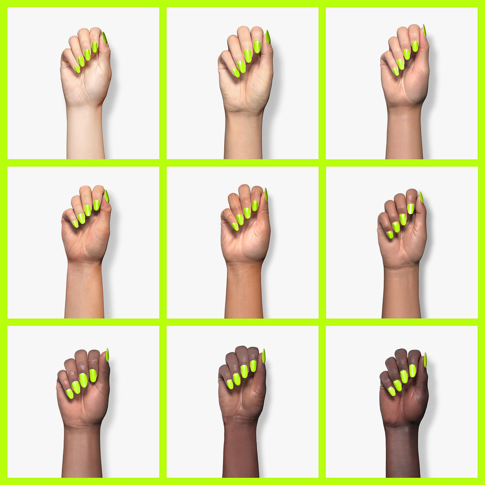 Beetles neon green on a nail tip illustrating cured shine and long-lasting wear