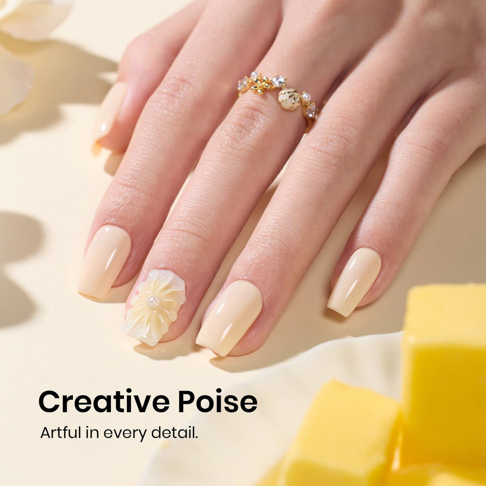 Beetles polish applied on natural nails demonstrating soft yellow daily-wear benefit