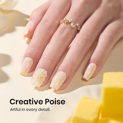 Beetles polish applied on natural nails demonstrating soft yellow daily-wear benefit