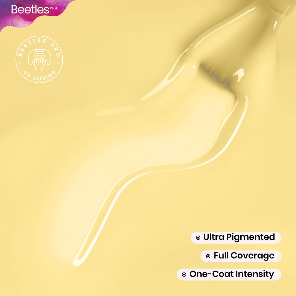Multiple swatches of Beetles PRO yellow on a fan showing color depth and layering options for manicures