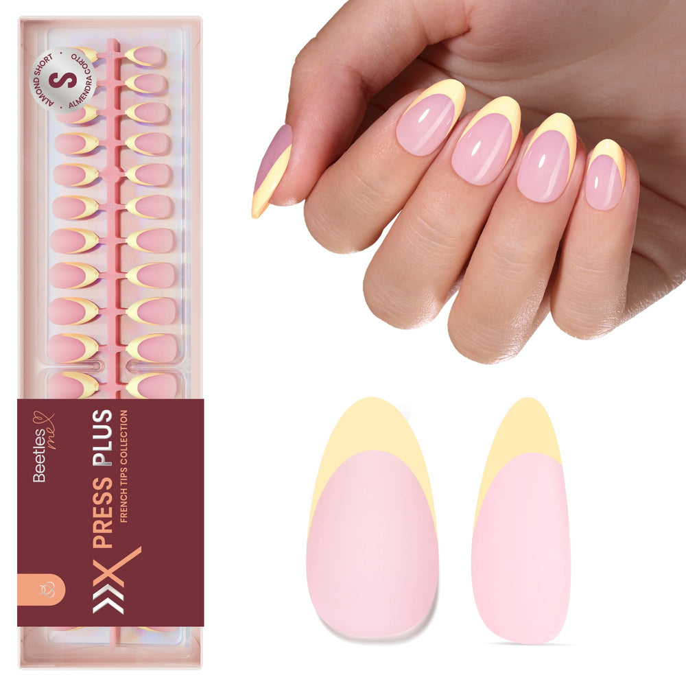beetles short almond nails top view displays neat yellow French tips