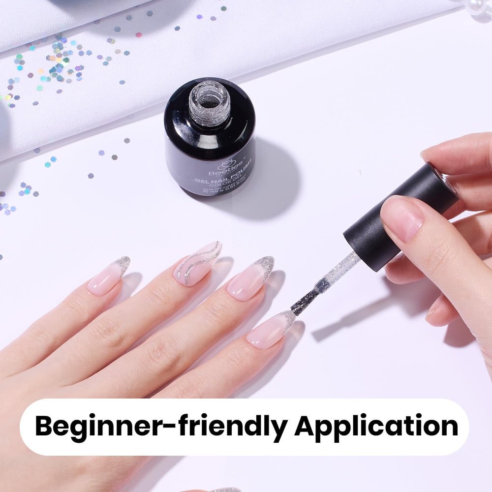 Beetles model hands wearing silver gel manicure for polished look