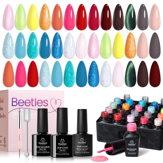 beetles bottles beside a hand for size comparison, communicates compact 5ml and 7.5ml volumes