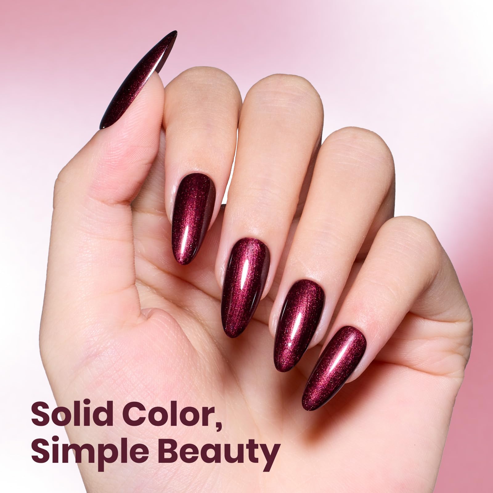 beetles swatch painted on fingertips showing burgundy glitter finish and salon shine