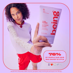 BEING INC hand detangling curls with wide tooth comb showing reduced breakage