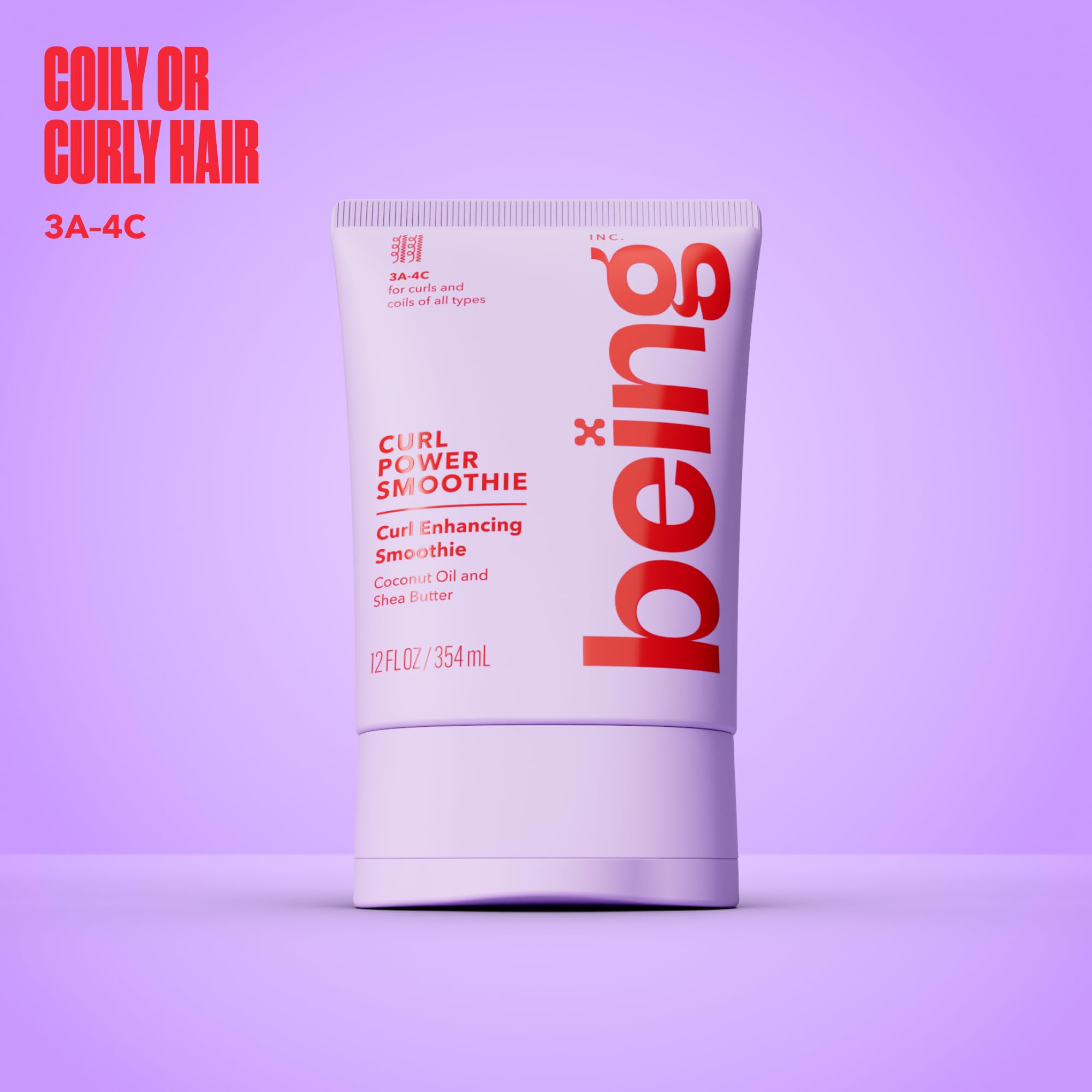 BEING INC cream on hand demonstrating Dream Curl Smoothie easy application and non-greasy feel