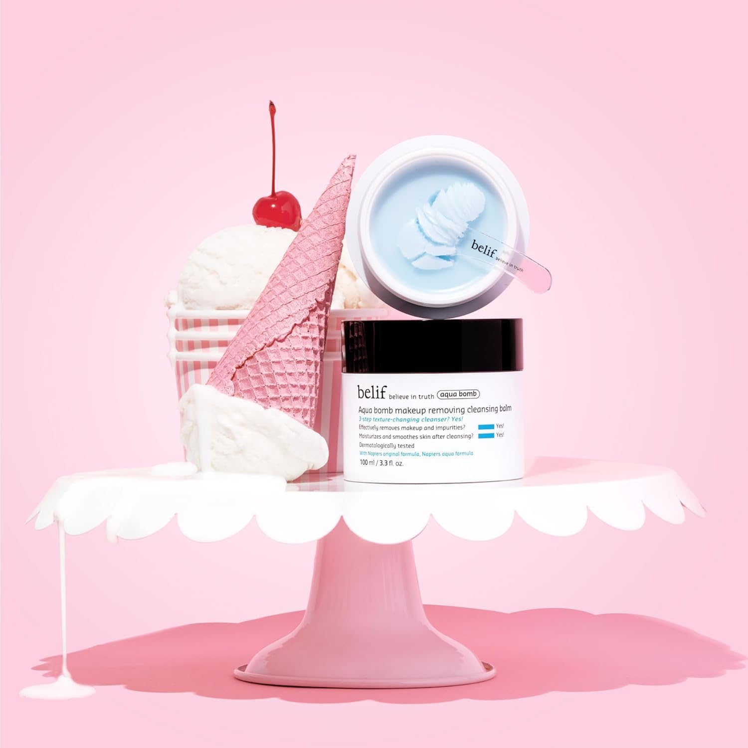 belif 3.3 fl oz jar held in hand showing true size and travel-friendly benefit
