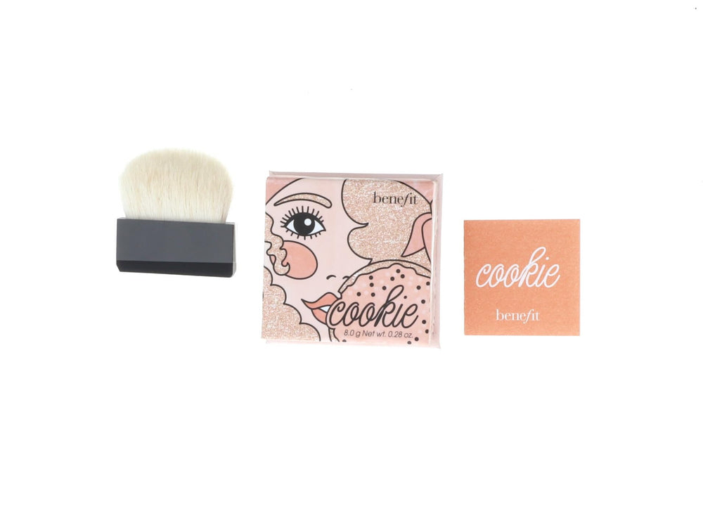 Benefit Cookie Powder front compact showing golden-pearl pan and sleek case for travel convenience