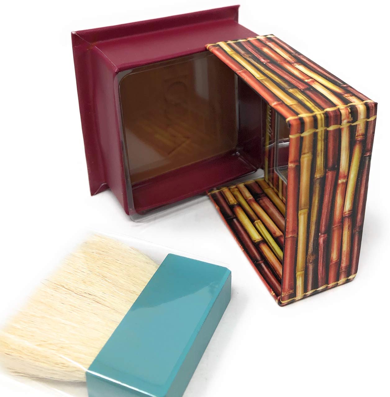 Benefit Hoola inside a makeup bag lifestyle shot showing on-the-go bronzing benefit