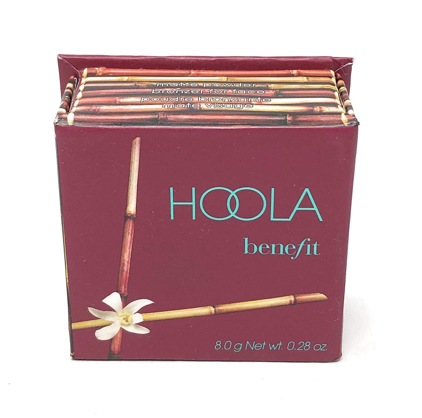 Benefit Hoola with brush in hand demonstrating easy application and quick touchup benefit