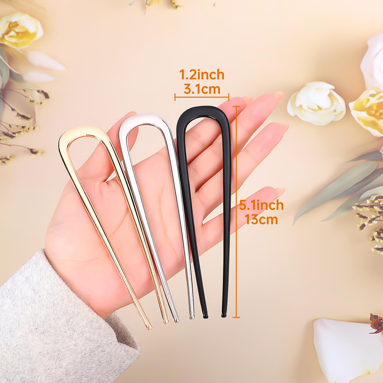 BEoffer pin held in hand to show size and easy portability for travel