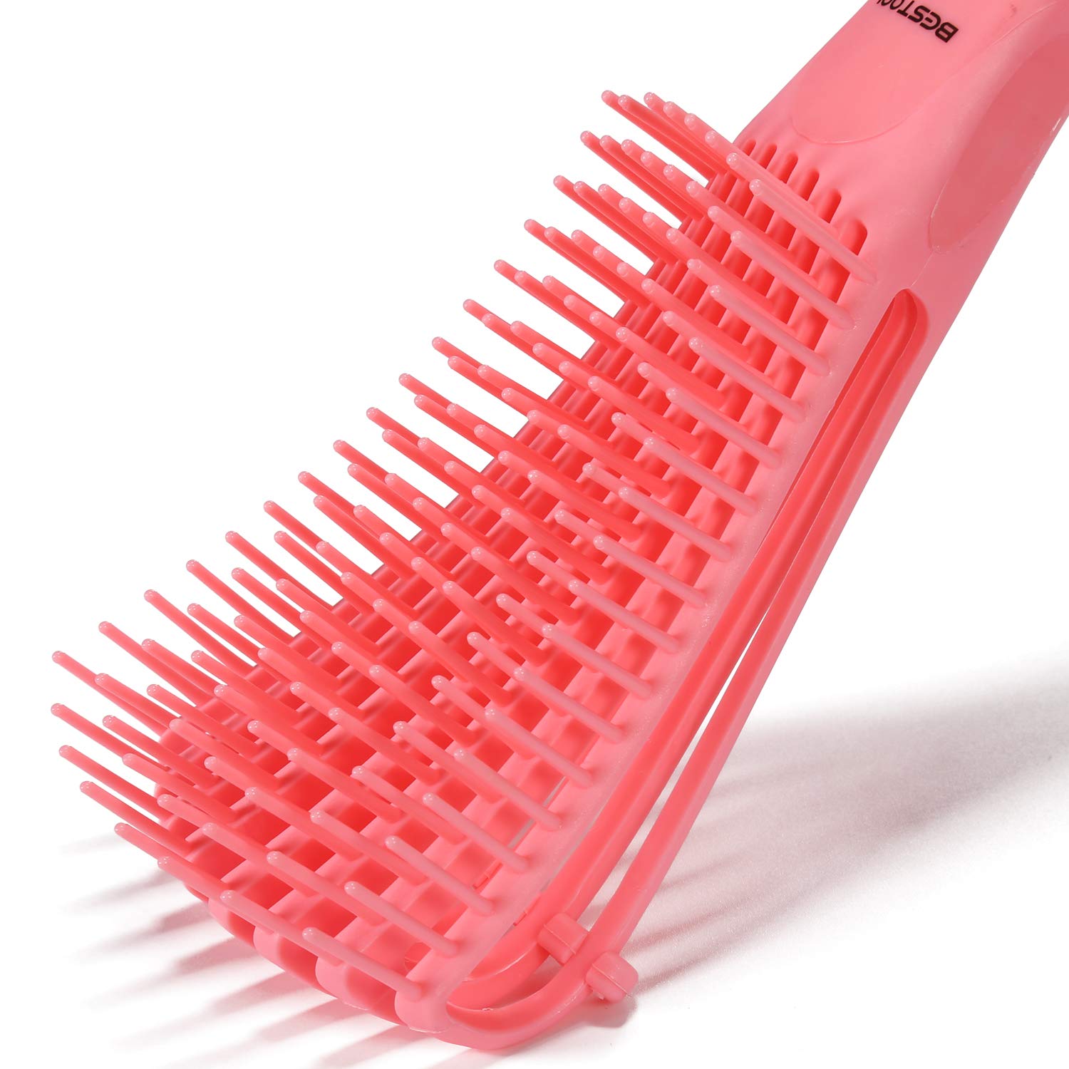 BESTOOL brush next to hand to show scale and easy maneuverability benefit