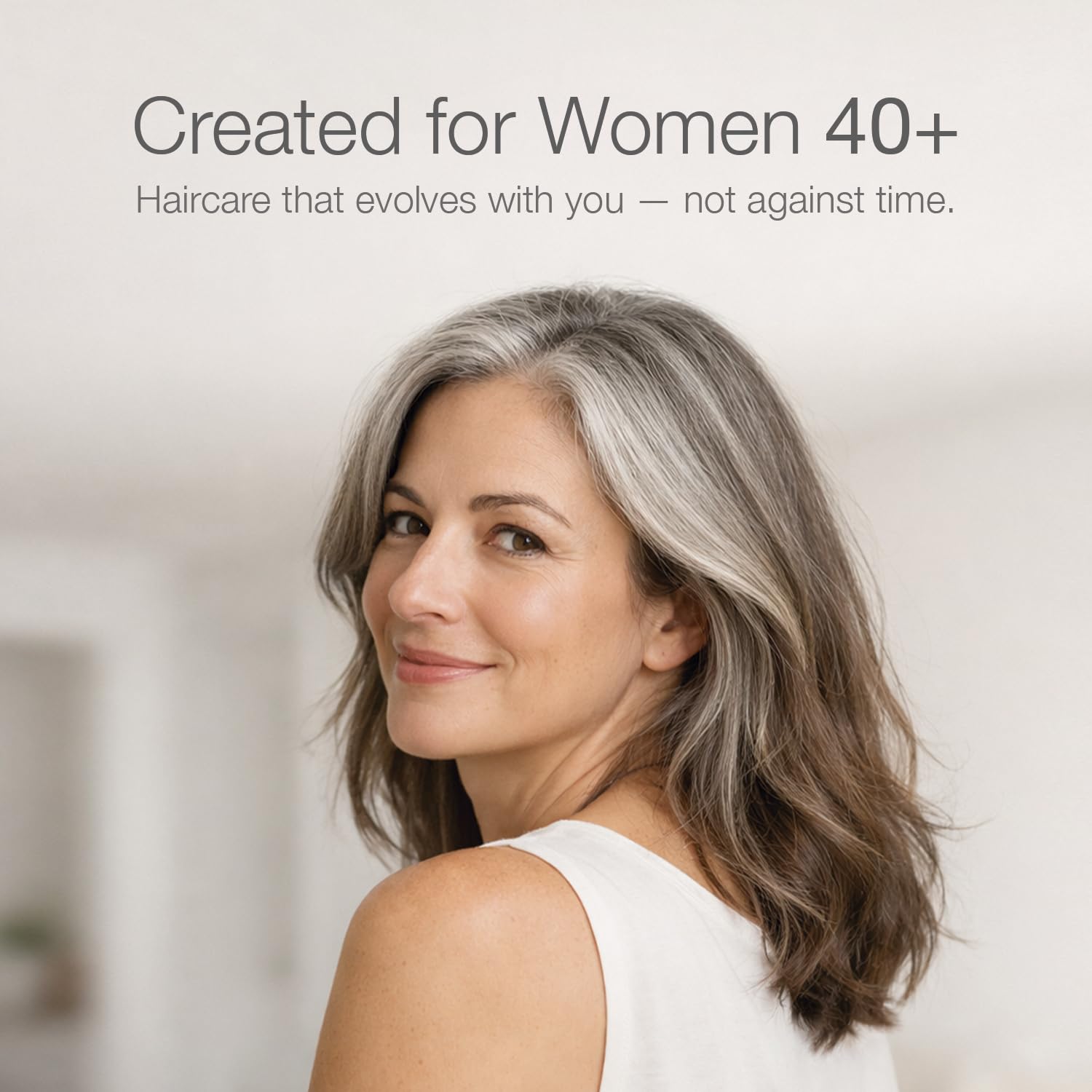 Better Not Younger mask being applied to towel-dried hair by hand for visible conditioning