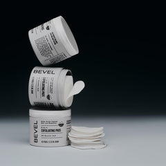 Bevel pads arranged on bathroom shelf suggesting daily skincare habit