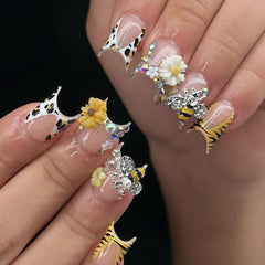 BHCCXZ charms applied on gel press-ons demonstrating easy use
