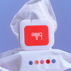 Billie single wipe being pulled from packaging for convenience