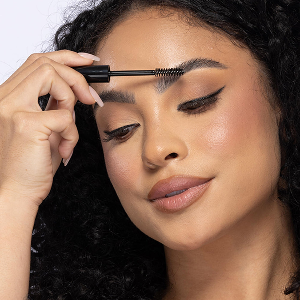 billion dollar brows clear gel applied on brows demonstrating neat, natural hold