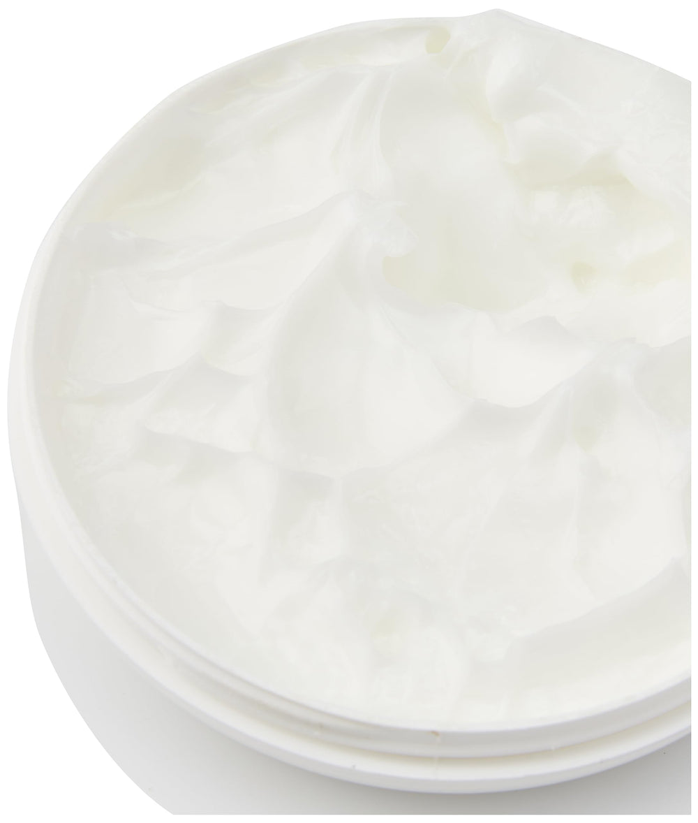 Biofresh cream texture close-up on fingertip, highlights lightweight absorbent finish