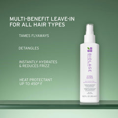 Biolage bottle held in hand to show actual size and travel-friendly convenience
