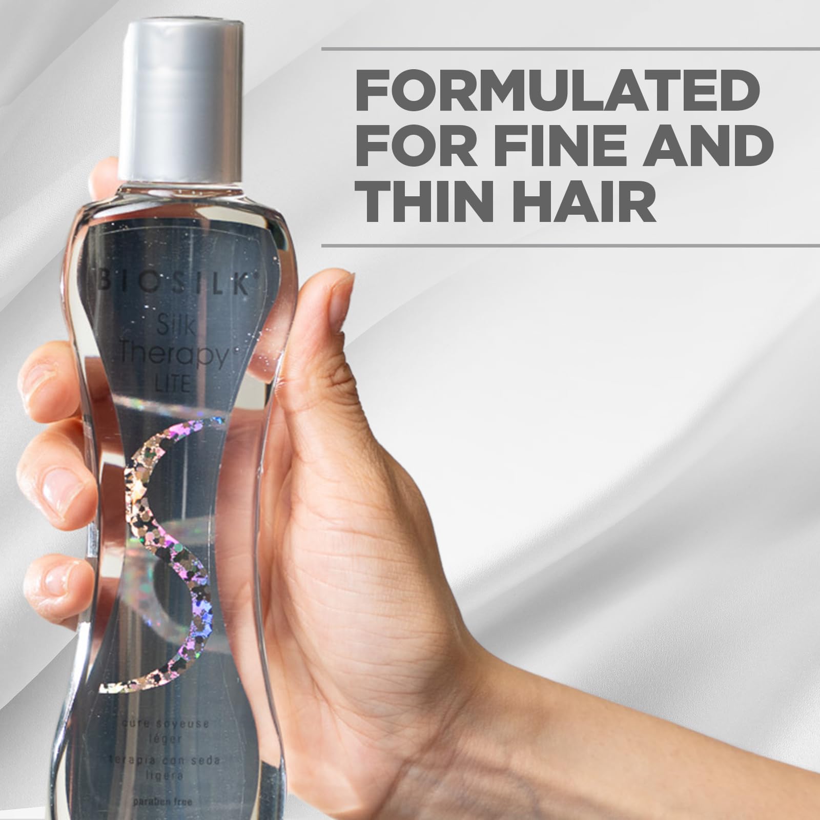 BioSilk texture drop on fingers showing lightweight consistency and shine