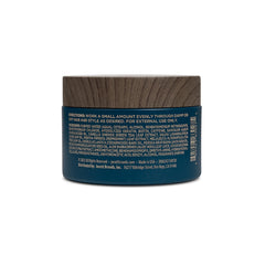 Blackstone pomade open jar texture highlighting pliable, lightweight formula