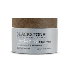 4 oz Blackstone jar next to ruler illustrating compact travel-friendly size