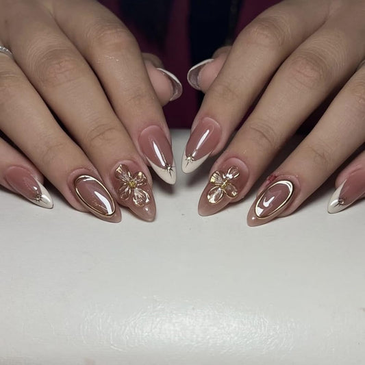 BLGTGH close-up of gold flower detail and metallic lines enhancing elegance