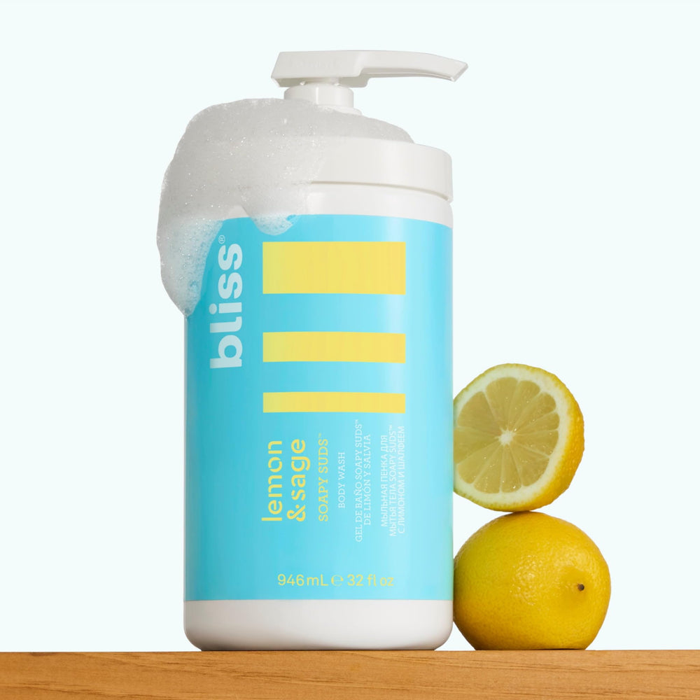 Bliss bottle beside a ruler showing 32 fl oz capacity and long-lasting benefit