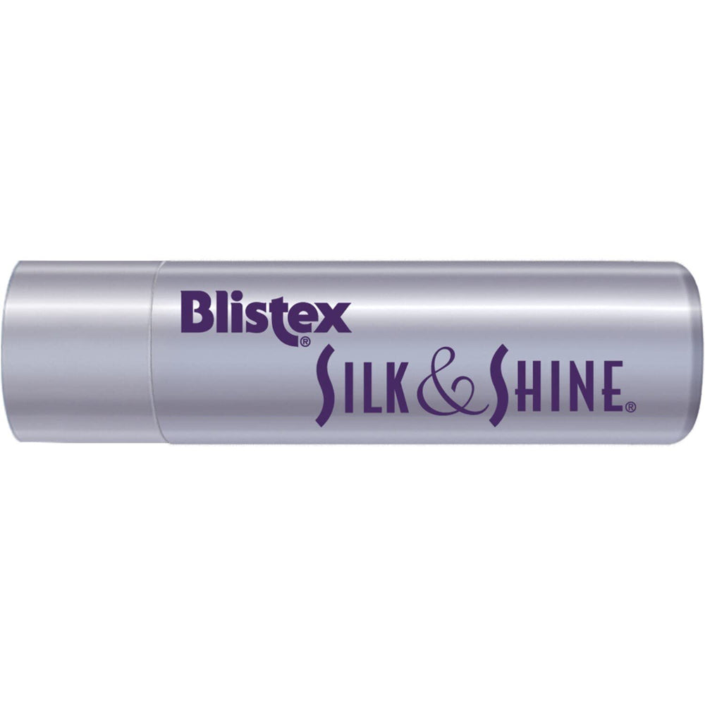 Hand holding Blistex Silk & Shine tube showing compact travel-friendly size