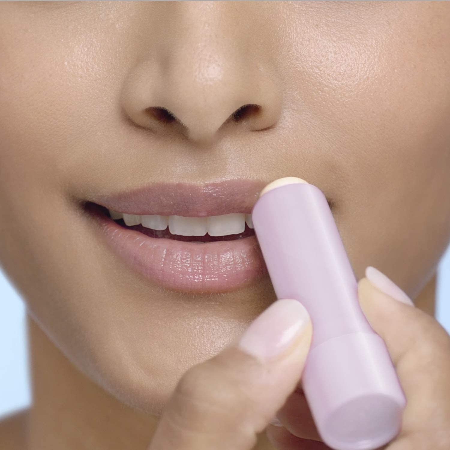Blistex Soft & Lush next to common items showing 0.13 oz tube size for easy portability