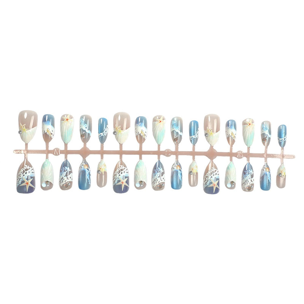 Bloazife nails worn on hand in summer setting adding instant beach-ready style