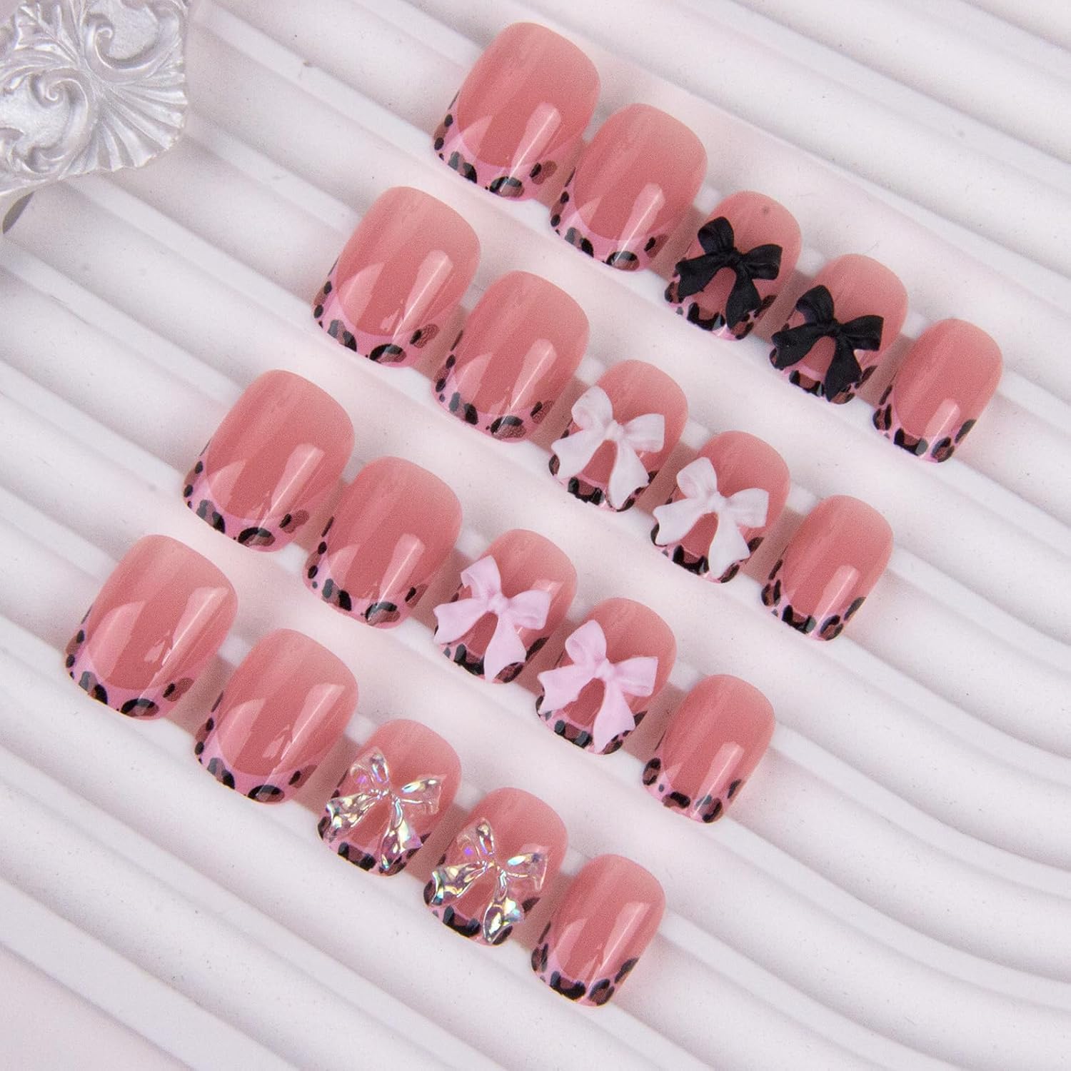 Bloazife side profile of short square nails demonstrating natural thickness and fit
