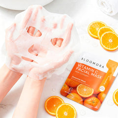 BLOOMORA model applying sheet mask demonstrating easy use