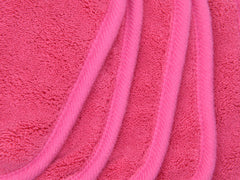 BloomSesame cloth beside a ruler showing 5x5 inch size for travel convenience