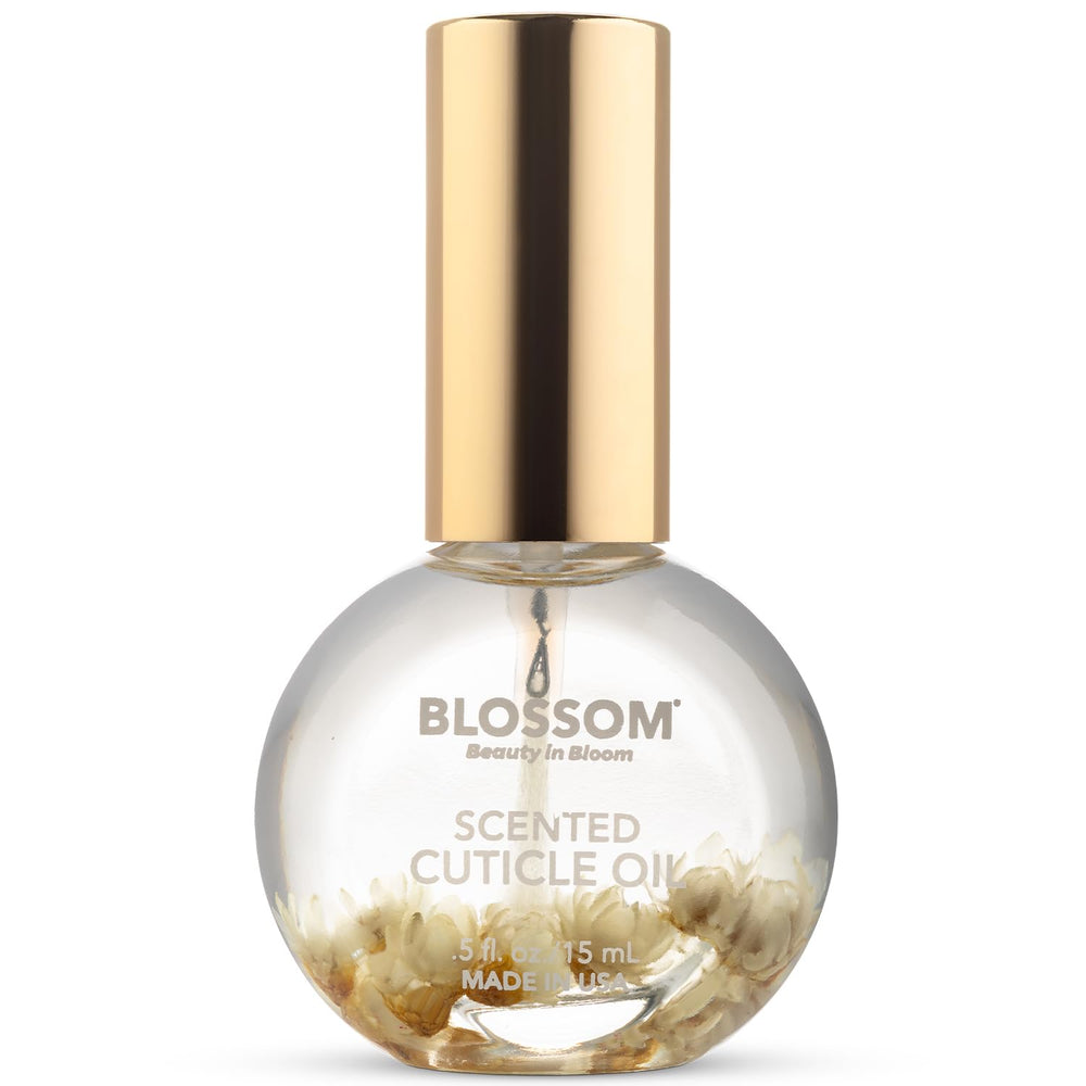 Blossom coconut cuticle oil front bottle showing floral infusion and appeal