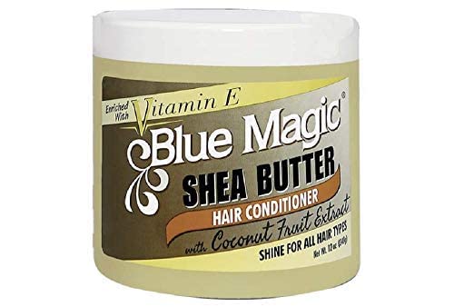 Blue Magic texture swipe on hand showing creamy shea butter consistency for smooth styling